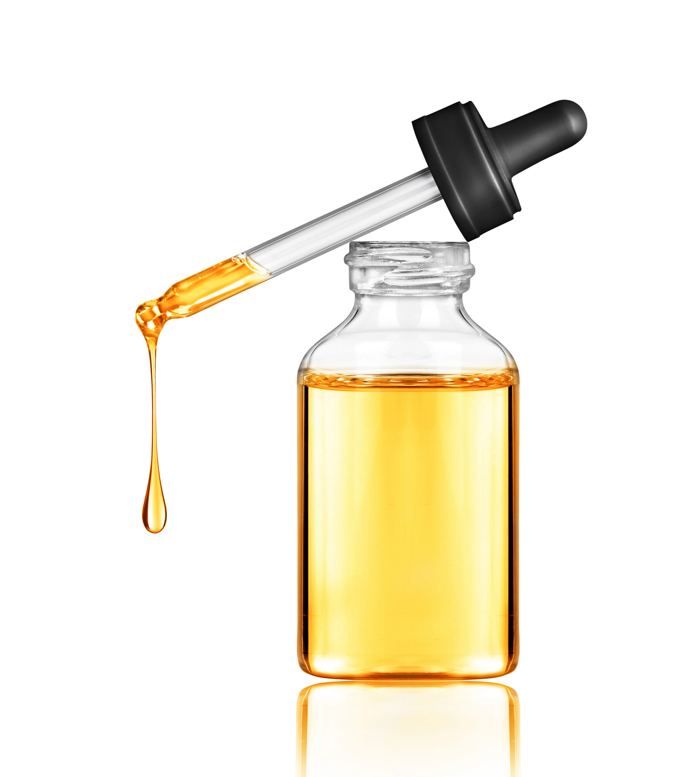 Oily,Drop,Falls,From,A,Cosmetic,Pipette,,Isolated,On,White