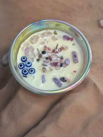 Hand-poured 16 oz Tropical Amber candle with a coconut apricot wax blend, featuring warm golden tones and a tropical-inspired fragrance aesthetic.