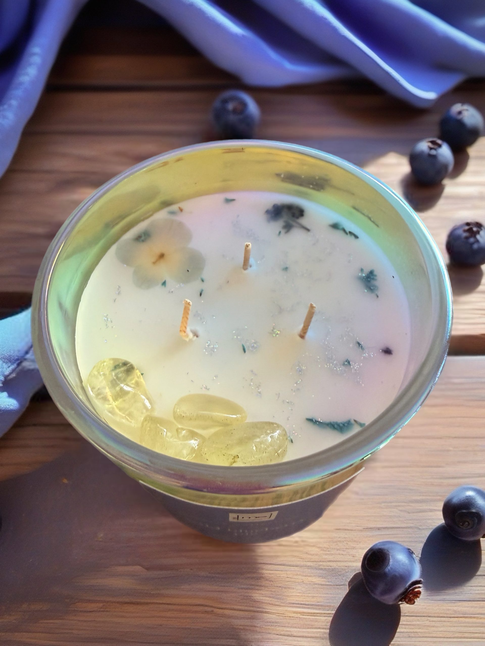 Sweet, vanilla blueberries and a warm glow make every moment a little more comforting. Fill your home with the delicious scent of fresh-picked berries. Hand-poured 16 oz vanilla Blueberry Bliss candle made with coconut apricot wax, featuring a sweet blueberry fragrance with warm vanilla notes for a cozy and inviting home atmosphere.
